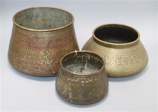 Three Persian engraved brass vessels